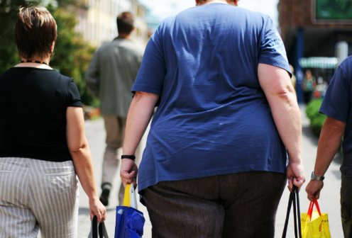An obese individual walking